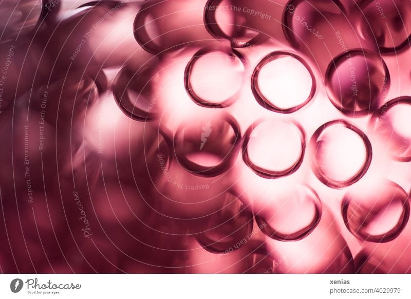 Röhrengleiche rote unscharfe Kringel mit Licht rund Strukturen & Formen Kreis abstrakt Unschärfe weich leuchten Hintergrundbild Trinkhalm Trinkhalme