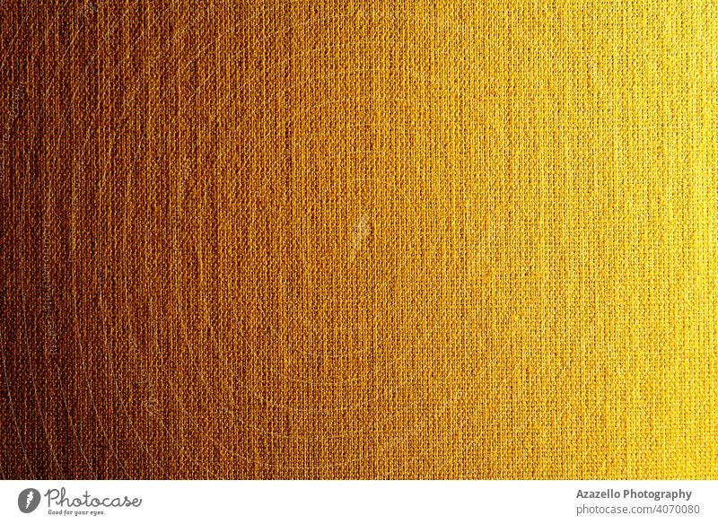 Gradiented Leinwand Textur in gelb-orange 2021 abstrakt Kunst Hintergrund braun Sackleinen Teppich Nahaufnahme Stoff Farbe Baumwolle Deckung