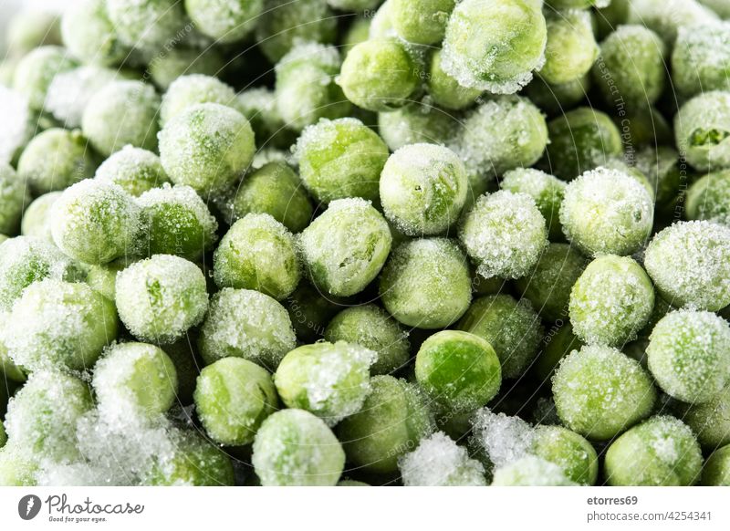 Gefrorene grüne Erbsen Hintergrund Ackerbau kalt Küche essen Lebensmittel frieren frisch gefroren Gesundheit Bestandteil organisch weiß