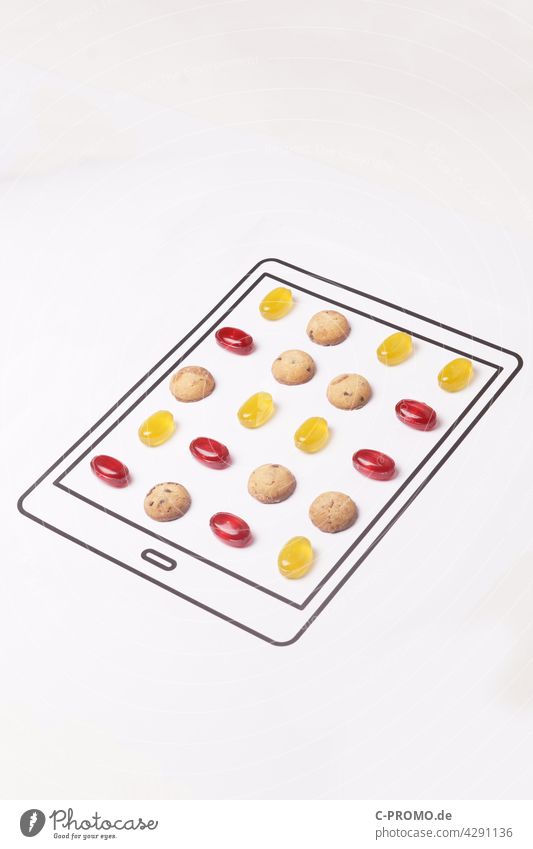 Analoges Candy Crush candy crush app mobil-game spiel puzzle-computerspiel essen obst süss weiß isoliert lecker close up köstlich übergewicht spielsucht zucker