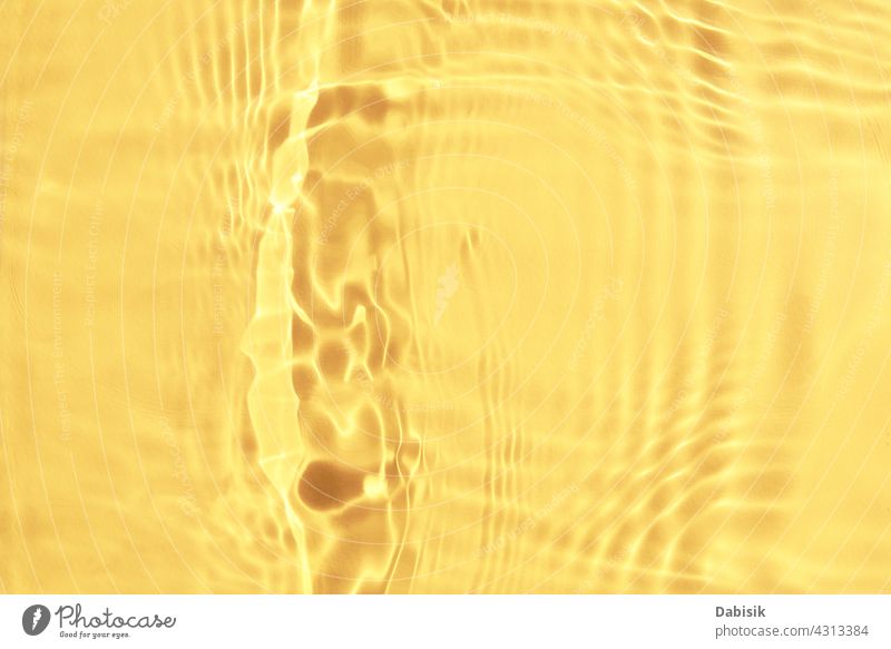 Gelbes Wasser Textur Hintergrund. Abstraktes Muster gelb Oberfläche aqua Tropfen winken Licht übersichtlich Rippeln Überzug Einfluss Natur Pastell Produkt