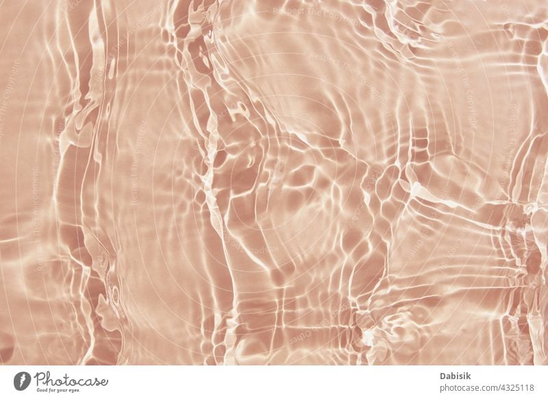 Beige Wasser Textur Hintergrund. Abstraktes Muster beige Oberfläche aqua Tropfen winken Licht übersichtlich Rippeln Überzug Einfluss Natur Pastell Produkt