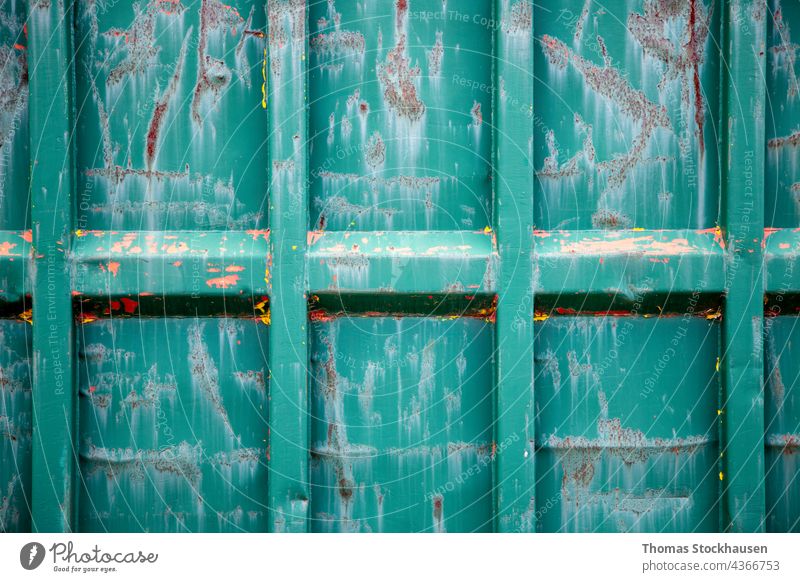 Seitenansicht auf einen Container, grün verwittertes Metall, Hintergrund abstrakt gealtert Kasten Ladung Nahaufnahme Textfreiraum Design dreckig Rahmen Fracht