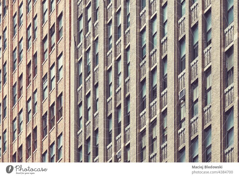 Close up Bild von New York City alten Backsteingebäude, Farbe getönten städtischen Hintergrund, USA. Großstadt neu Gebäude Büro Wolkenkratzer Wand Manhattan