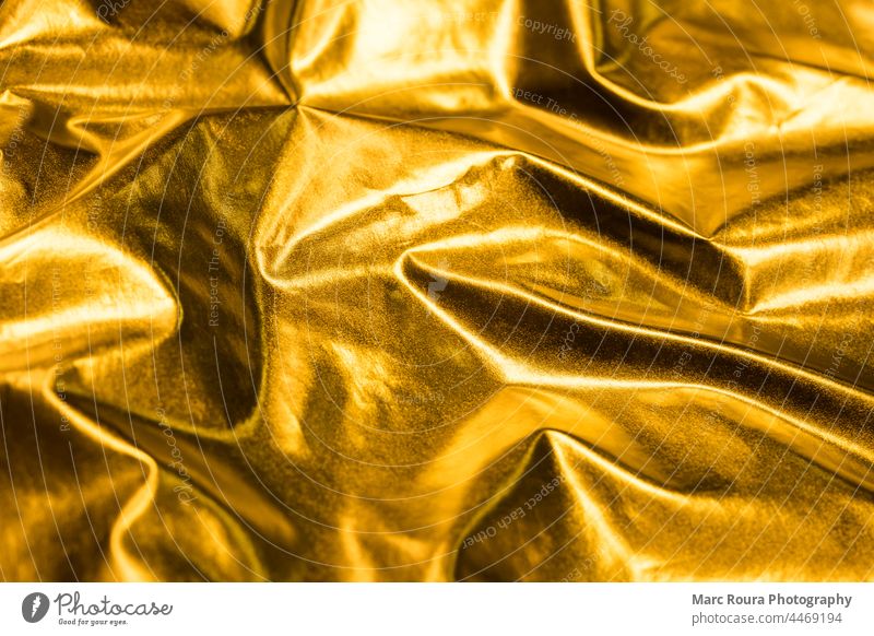 einen Hintergrund aus goldenem Seidenstoff 2022 abstrakt Kunst feiern Feier Weihnachten Stoff Farbe farbenfroher Hintergrund Dekoration & Verzierung Design