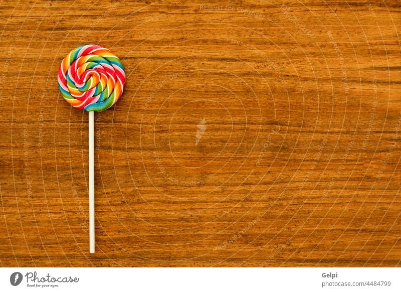 Schöner Lutscher mit vielen Farben Bonbon Lebensmittel Lollipop süß Kies Zucker weiß lecker farbenfroh kleben Hintergrund Dessert ungesund rot geschmackvoll
