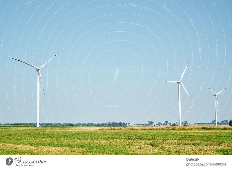 Windturbinengenerator im Einsatz regenerativ Energie Ökostrom Windmühle Windkraftanlage Erzeuger Turbine Ökologie Ackerbau alternativ Hintergrund Klinge