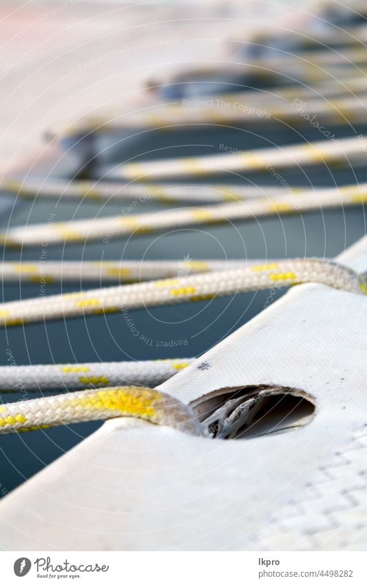 abstrakte Textur der Plastikdecke und des Seils MEER Segeln Katamaranjacht Segelboot Karibik weiß reisen Urlaub Unschärfe Meer Sommer Schiff nautisch Kreuzfahrt