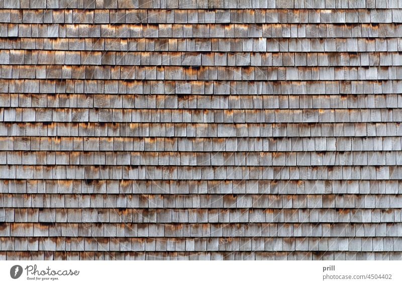 Holzschindeln Schindeln hölzern Klappe mit Wetterschutzbrettern voller Rahmen Hintergrund verwittert viele gerudert Fassadenverkleidung deckend Muster
