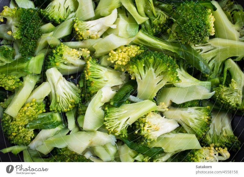 Brokkoli asiatisch Hintergrund kochen Nahaufnahme Koch Essen zubereiten Küche Diät essen Lebensmittel Feinschmecker grün Gesundheit Bestandteil Mahlzeit orange
