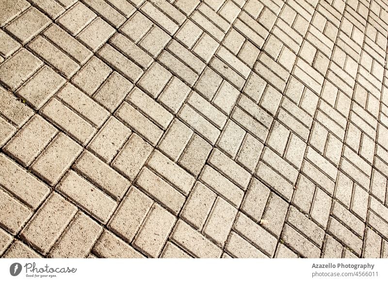 Diagonale Ansicht des Pflasters mit geometrischer Steinschicht. Minimalismus Hintergrund Textur diagonal Winkel Dekoration & Verzierung Bodenbelag Nahaufnahme