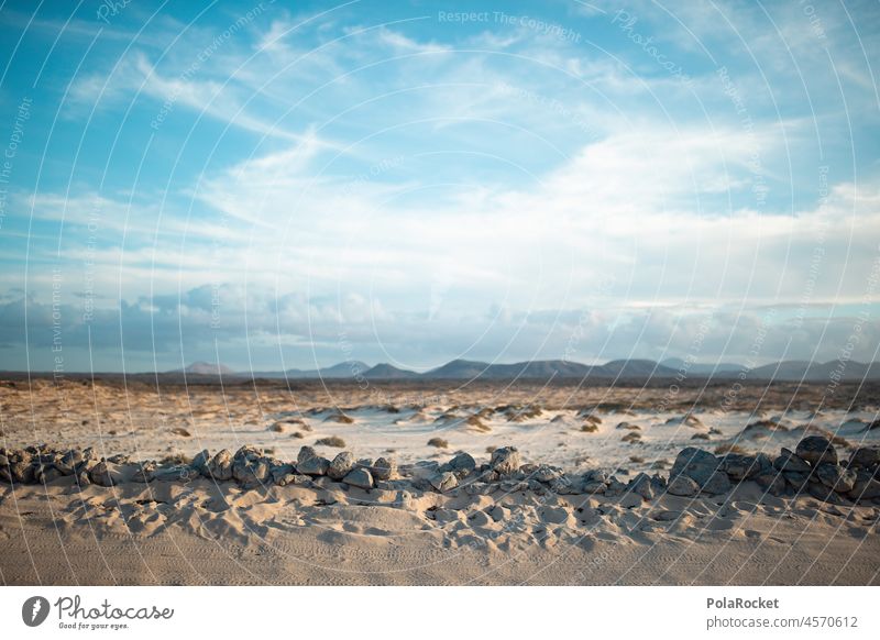 #A0# Punta Landschaft Sand karg karge Landschaft Kanaren Kanarische Inseln Fuerteventura Himmel Wüste Mauer Tourismus Sommer Spanien