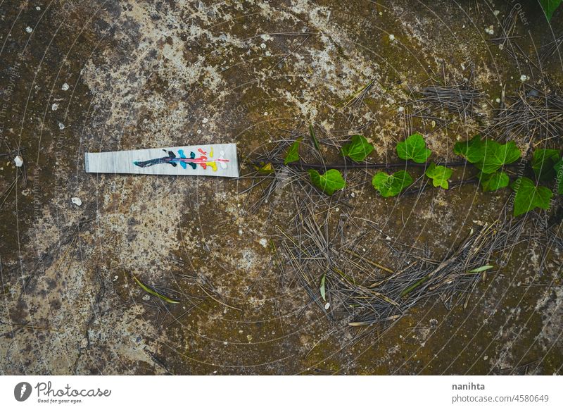 Ölgemäldeentwurf vor natürlichem Hintergrund Kunst Natur Erdöl Farbe Künstler Anstreicher zeichnen Design mischen im Freien Wald Hinterhof Palette farbenfroh