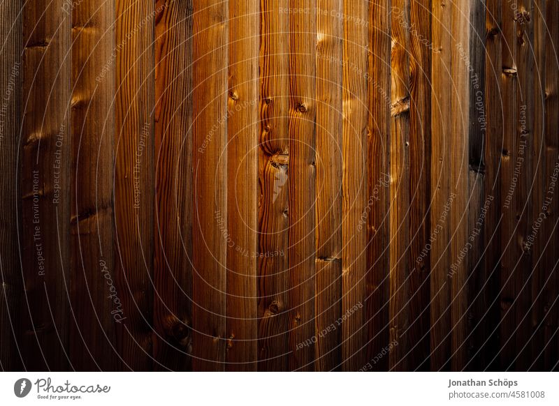 dunkel braune Holztextur gleichmäßig als Hintergrund Menschenleer Abnutzung Außenaufnahme Wand Hintergrundbild Oberflächenstruktur flach Muster einfach