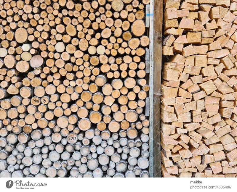 Rund oder Eckig, sie haben die Wahl Holz Brennholz Brennholzlager Vorrat Lager Wand Stapel Holzscheite Kamin Kaminholz Ofen Ofenheizung Heizung Winter warm kalt