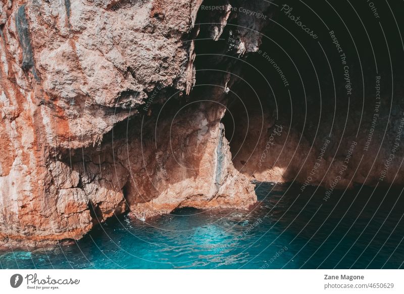 Eingang zu einer Meereshöhle, Mittelmeer, Griechenland Höhle MEER mediterran Europa blau Küste Natur Crete Landschaft Ferien & Urlaub & Reisen Kontrast Schatten
