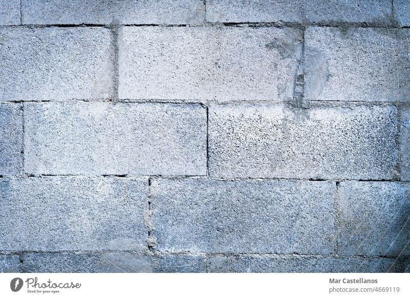 Natürliche graue Ziegel Textur. Betonblock Wand Hintergrund. Baustein Klotz Stein Zement Mörtel alt Antiquität ländlich Konstruktion Baustelle Gebäude