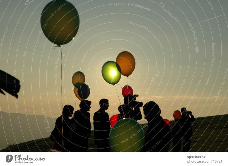 Sonne in Ballon Mensch Lichtspiel Silhouette Luftballon