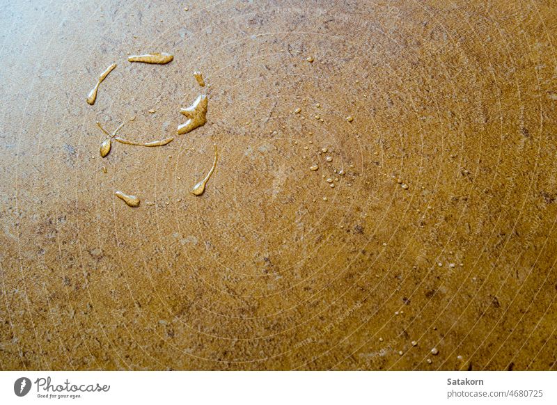 Wassertropfen auf keramischen Bodenfliesen Tropfen Gesäß kalt Tasse braun orange Keramik Farbe Dekoration & Verzierung Element Stock Muster Oberfläche Textur