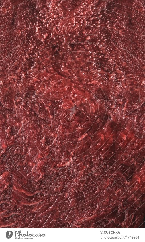 Textur von rohem Rindfleisch. Nahaufnahme. Fleisch abschließen Metzger Hintergrund Draufsicht Rindersteak Fleisch schlachten Lebensmittel Feinschmecker rot
