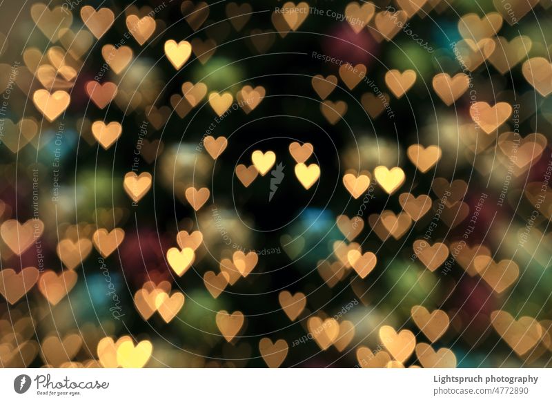 Abstact herzförmigen Bokeh Hintergrund Textur. abstrakt Licht Romantik Liebe - Emotion Weihnachten Valentinstag Unschärfe Feiertag hell Valentinskarte gold