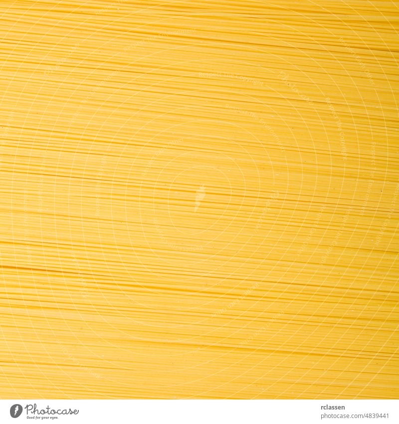 Spaghetti Nudeln Textur Hintergrund Haufen essen gelb lang Diät roh Ernährung Italien Kohlenhydrate ungekocht Lebensmittel Ei Italienisch Makro Hartweizen