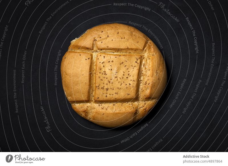 Leckeres Brot aus dem Ofen Brotlaib gebacken Sesam Bäckerei Muster Lebensmittel kulinarisch natürlich organisch appetitlich lecker geschmackvoll Samen rund