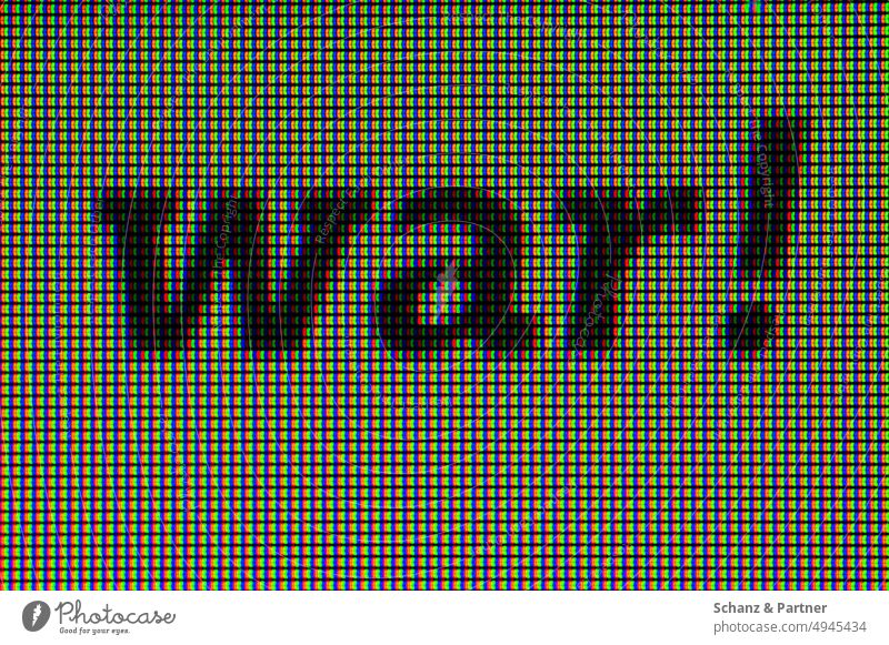 Makroaufnahme eines Monitors mit dem Wort war! Pixel RGB Medien Presse Propaganda social media Internet Social Media Medienpädagogik Krieg Schrift Buchstaben
