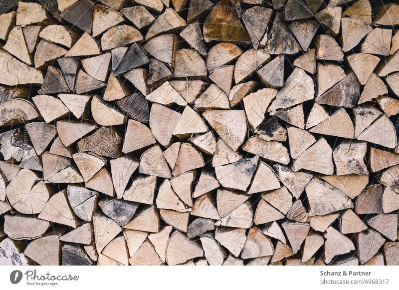 Aufgesetzte Brennholz Scheite Holz heizen Winter Textur Holz hacken Wärme Holzstapel Stapel Forstwirtschaft Brennstoff Nutzholz gestapelt
