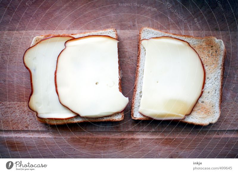 doppelt gemoppelt Lebensmittel Käse Teigwaren Backwaren Toastbrot Ernährung Frühstück Vegetarische Ernährung Fingerfood liegen authentisch eckig einfach