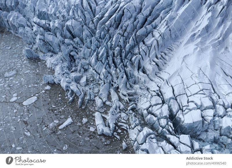 Landschaftlich reizvolles Vulkangelände mit strukturiertem Gletscher Eis gefroren Winter Textur Hintergrund massiv Formation vulkanisch Natur Oberfläche rau