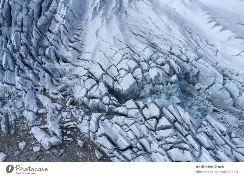 Landschaftlich reizvolles Vulkangelände mit strukturiertem Gletscher Eis gefroren Winter Textur Hintergrund massiv Formation vulkanisch Natur Oberfläche rau