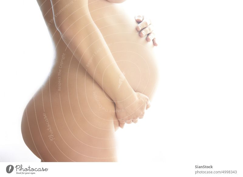 Junge schwangere Frau nackt Profil Bauch Schwangerschaft erwartend Mutter Mutterschaft Liebe Baby weiß Unterleib Beteiligung Geburt Magen schön jung Leben