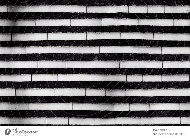 Raue schwarze Ziegelwand rau Grunge abstrakt Beton retro grau Struktur texturiert dreckig Tapete gealtert altehrwürdig Material Innenbereich veraltet Oberfläche