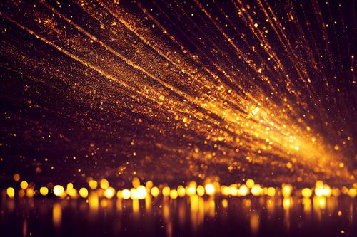 Abstrakte goldenen glitzernden in der dunklen Hintergrund mit verschwommenen Bokeh Lichter Kulisse abstrakt Staubwischen festlich Glamour glühen