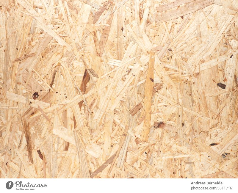 Textur einer Osb-Platte als Hintergrund osb Holzplatte Panel Chip wiederverwerten rau Schiffsplanken Detailaufnahme Natur Schreinerei wiederverwertet Gebäude