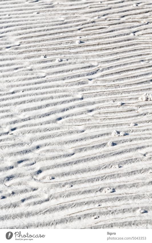 und die abstrakte Textur des weißen Strandes Sand Hintergrund sandig Düne Natur wüst texturiert trocken unfruchtbar schön tropisch dreckig Zement Kieselsäure