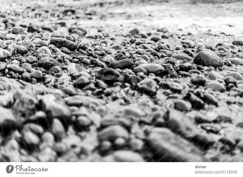 2022 08 18 Madeira Kieselstein 3 Strand Felsen Ufer Natur Hintergrund Kieselsteine Stein Haufen abstrakt Textur Wasser Küste natürlich Form Mineral Meeresufer