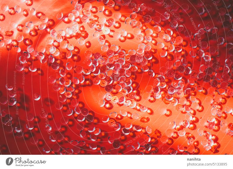 Roter Hintergrund mit vielen kleinen Diamanten auf einer Wasseroberfläche rot elegant Schmuck Vermögen Muster abstrakt Sauberkeit neu Reichtum Glanz Licht