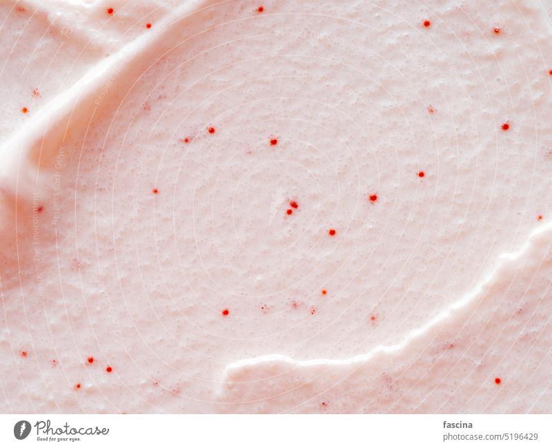 Scrub schmiert. Rosa Peeling Körper Politur Textur bürsten gommage Kosmetik Gesicht zerdrückt Pastell rosa polnisch Hintergrund Textfreiraum Draufsicht