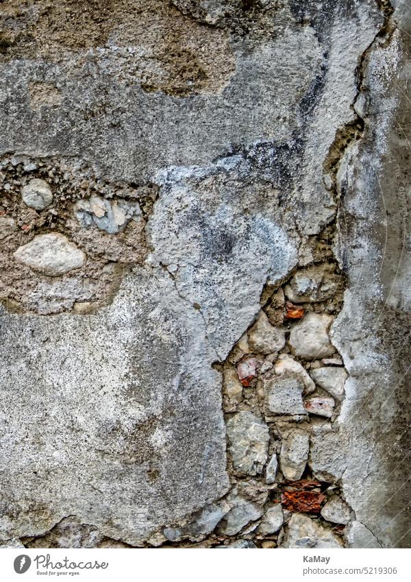 Oberfläche einer verfallenen steinernen Mauer als Hintergrund Stein Hintergründe background Textfreiraum Steine Architektur Details Textur Texturen Muster