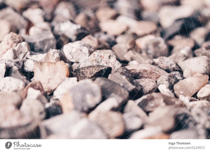 Eine Fläche von Kieselsteinen. Steine grau Nahaufnahme Muster