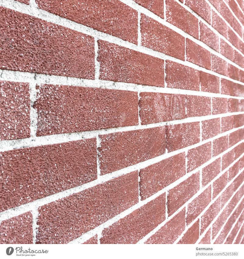 Nahaufnahme einer Backsteinmauer, die in der Unendlichkeit endet Wand Baustein Gebäude rot Struktur Perspektive Hintergrund Muster Textur Architektur Stein