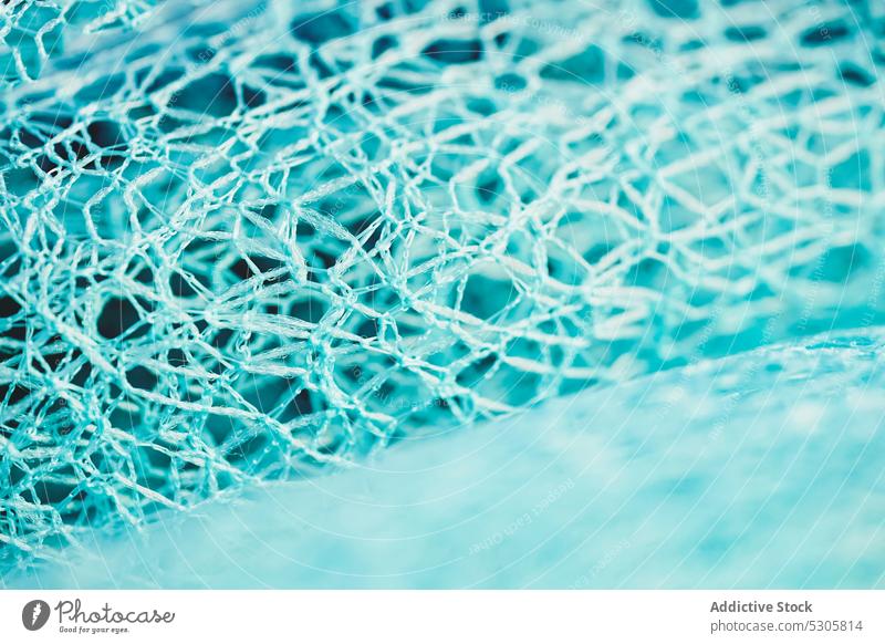 Abstrakter Hintergrund aus blauem Netz Textur ineinander greifen Golfloch Oberfläche Material abstrakt Muster Hobby viele Design Detailaufnahme kreativ uneben