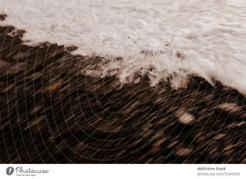 Schaumiges Meer wogt am Sandstrand winken MEER Ufer Strand Stein schäumen nass Wasser Küste Umwelt Lanzarote Natur platschen Spanien Kanarische Inseln