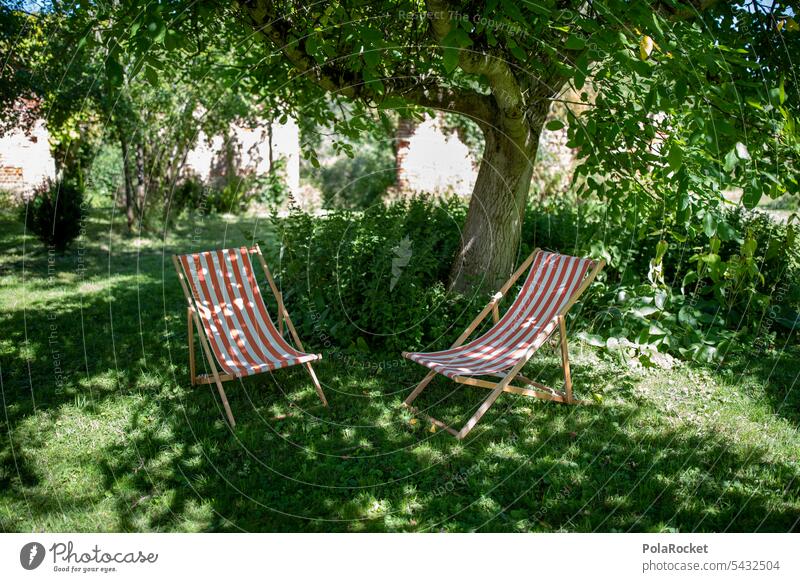 #A0# Stühle im Garten Kleingarten naherholung liegen relaxen Naherholungsgebiet Tourist genießen Sonnenbad Sonnenlicht Liegestuhl Wohlgefühl Tourismus gestreift