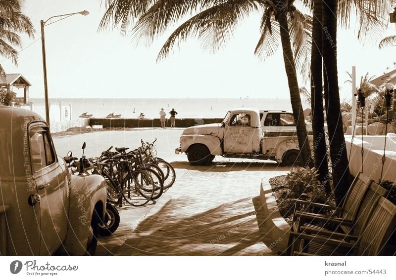 key west beach retro Strand old car Sepia Palme tranquility bicycles chairs calm ocean