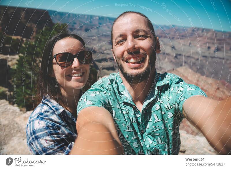 USA, Arizona, Grand Canyon National Park, glückliches Paar bei einem Selfie Selfies Glück glücklich sein glücklichsein Pärchen Paare Partnerschaft Mensch