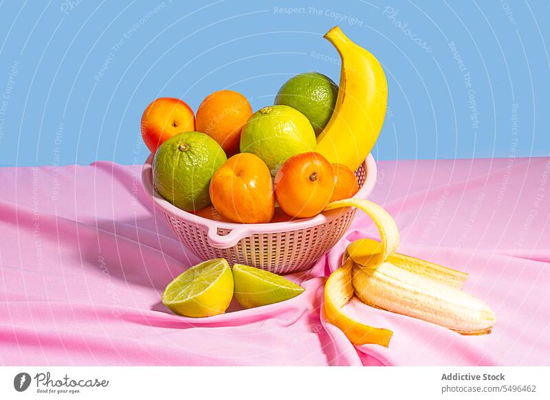 Obstschale auf dem Tisch Frucht natürlich Gewebe farbenfroh tropisch exotisch frisch hell reif ganz organisch Vitamin lecker Textil Aroma Kumquat glühen