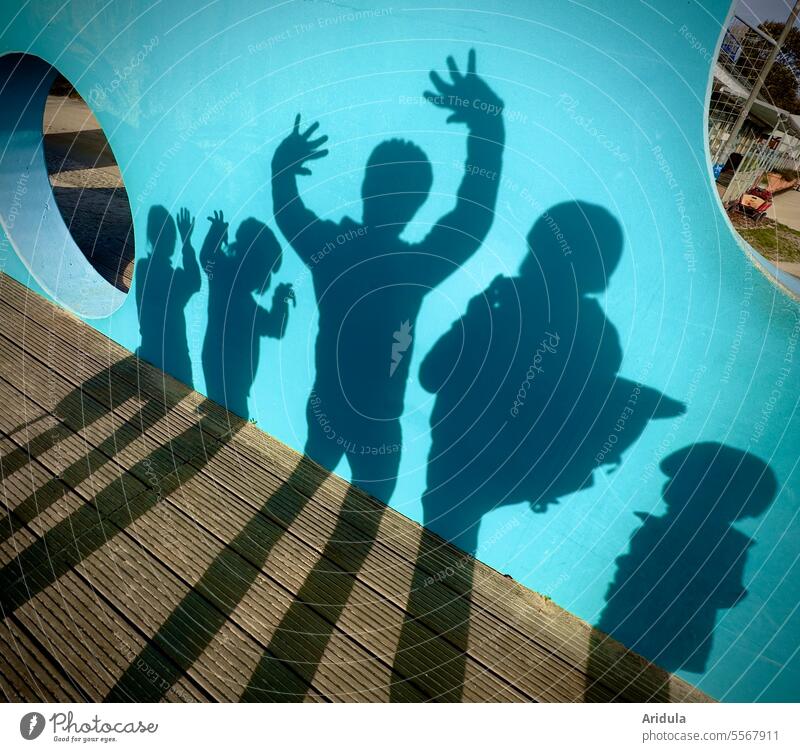 bewustseinserheiternd | Schatten-Familienfoto Wand Personen Menschen Arme Körper Pose Gruppe Erwachsene Kinder Schattenspiel Schattenwurf Kontrast Silhouette